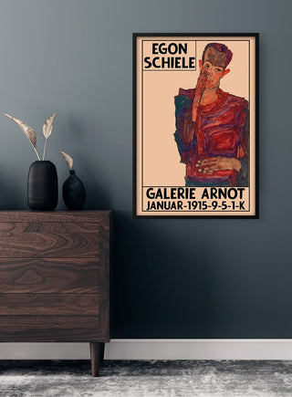 Framed Egon Schiele - Gallerie Arnot Plakat displayed on a dark wall above a mid-century dresser.