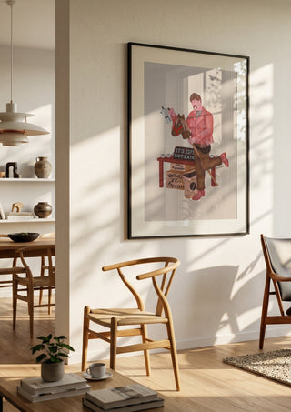 Coffee side hustle by Daukantė in a black frame in a bright dining room with wooden chairs