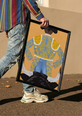 Butt fighter by Jaron Su carried in a black frame along a sunny street