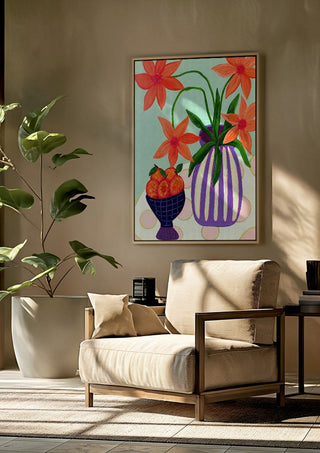 Plums & Peace by LGDyrby framed above a beige armchair beside a potted plant