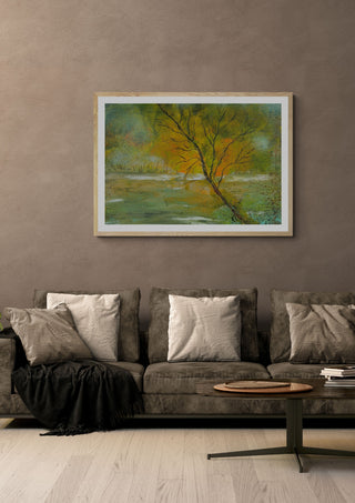 Tree in Gold Light by luco art in a light wood frame above a grey sofa with cushions