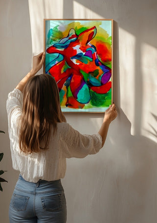 Color Pitbull 2 by Nittaart being hung on a sunlit wall
