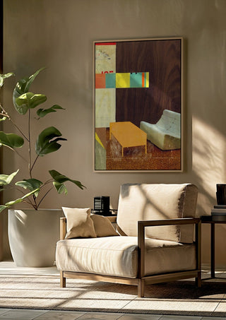 White Sofa by Kareem Rizk framed above a beige armchair beside a potted plant