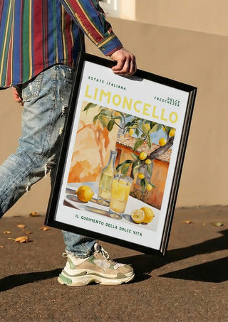 La dolce vita - Limoncello by Ohkimiko carried in a black frame along a sunny street