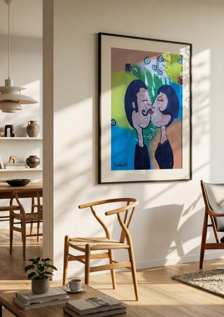 Der Kuss im Glücksregen by Trude in a black frame in a bright dining room with wooden chairs