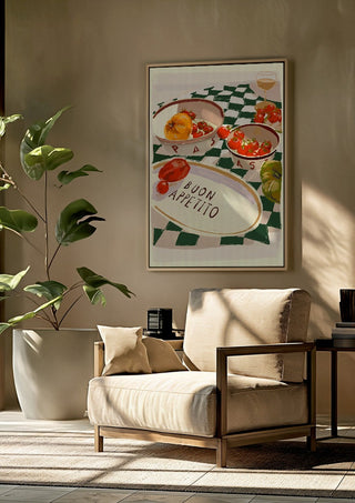 Buon Appetito by ThingDesign framed above a beige armchair beside a potted plant