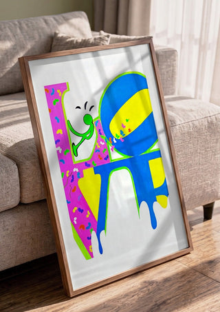 SAVE YOUR LOVE by NKo in a walnut frame leaning against a grey sofa