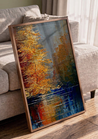 Autumn on the Water by Justyna Kopania in a walnut frame leaning against a grey sofa