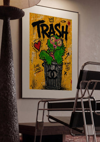 Trash x Grafitti by Decker Studios framed in a dim room beside a tubular steel chair