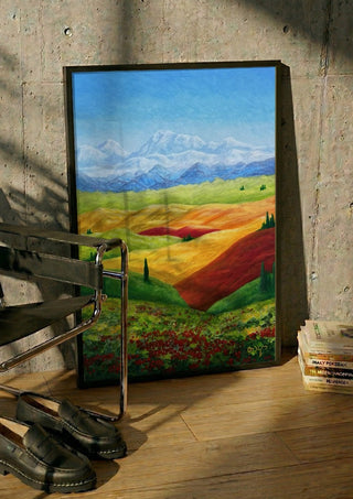 Toscana by Tako in a black frame leaning against a concrete wall by a steel chair
