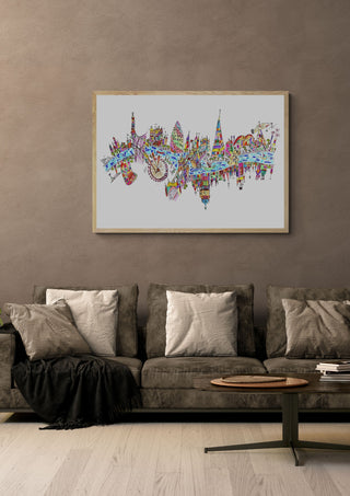 London by ullimcart in a light oak frame above a grey sofa on a warm brown wall