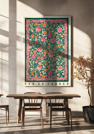 Vie de Jardin by Annika Persson hanging above a wooden dining table in warm sunlight