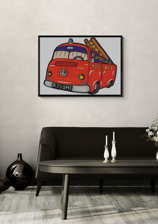 Firetruck by KaroGaiaArt in a black frame above a dark sofa with candlesticks on a round table