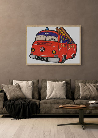 Firetruck by KaroGaiaArt in a light oak frame above a grey sofa on a warm brown wall