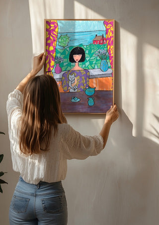 Tea by the Sea by Camilla Nilsson being hung on a sunlit wall