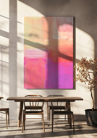 soft atmospheric composition by Iris Lehnhardt hanging above a wooden dining table in warm sunlight