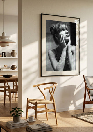 The Russian ballet dancer by Bettinafloorphoto in a large black frame in a bright dining room