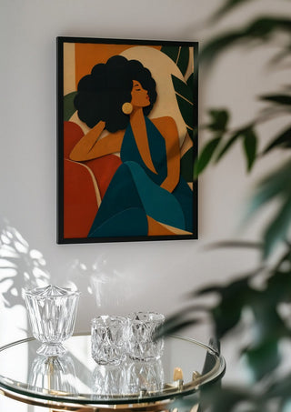 Modern Muse by ArtySjak in a black frame above a glass table with crystal glassware