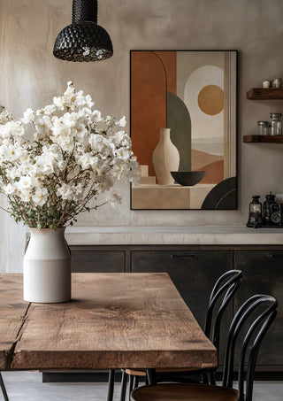 Earth Tones and Minimalist Shapes by TimlessArtworks in a black frame above a rustic table with white flowers