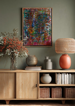 Augenblick by ullimcart above a wooden sideboard on a sage green wall