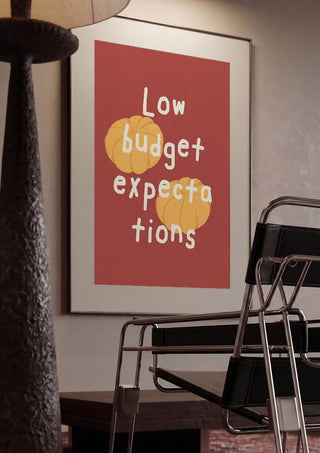 Low Budget Expectations by Jakob Falkenberg framed in a dim room beside a tubular steel chair