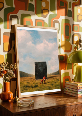 Son, this is the Universe by Fran Rodriguez in a wooden frame on a sideboard against a retro patterned wall