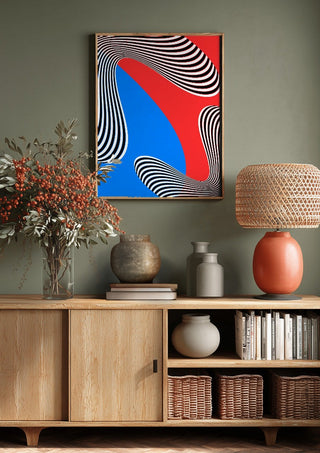 Stripes by Aleksi Allan above a wooden sideboard on a sage green wall