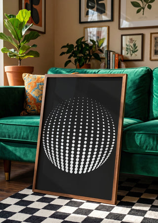 Bubbles by Aleksi Allan in a wooden frame leaning against a green velvet sofa on a chequered floor
