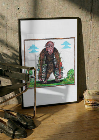 Ape with Books by Waldemar Mandzel in a black frame leaning against a concrete wall by a steel chair