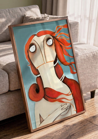 Die Venus by lacaluna in a walnut frame leaning against a grey sofa