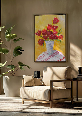Tulips - II by Deblina Dey framed above a beige armchair beside a potted plant