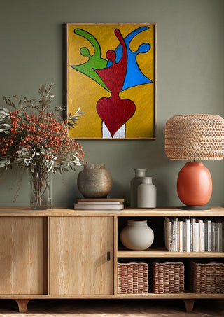 The Synthesis of Sel by Bibi above a wooden sideboard on a sage green wall