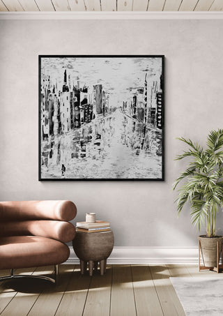 Beyond Time by Sabine Halbrock in a black frame above a pink armchair beside a palm