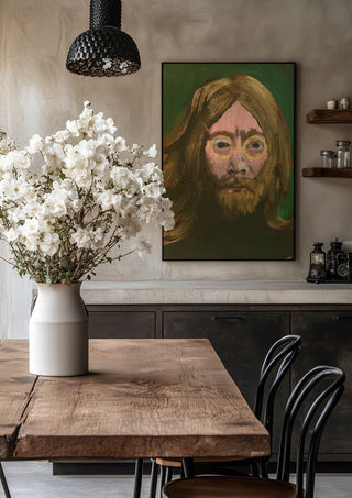 Lennon by Ian Frederick Harris in a black frame above a rustic table with white flowers