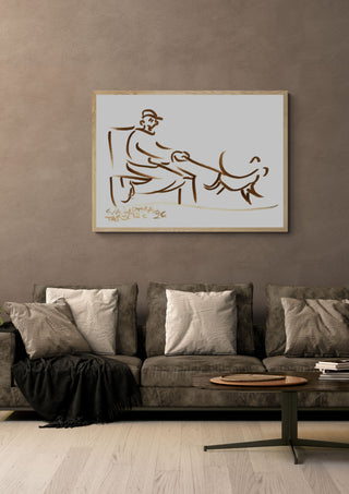 Man and Dog by Eva Hartman in an oak frame above a grey sofa with cushions