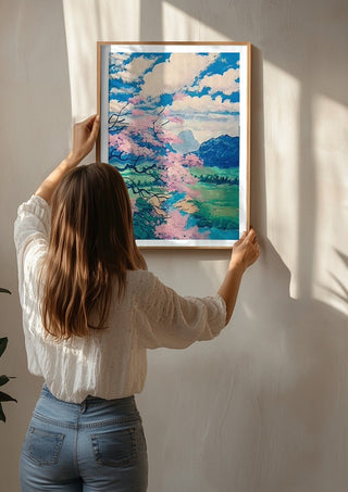 Where Whispers Meet the Monolith by Bibi being hung on a sunlit wall