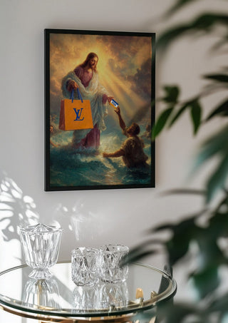 Divine Exchange by Dikhotomy in a black frame above a glass table with crystal glassware
