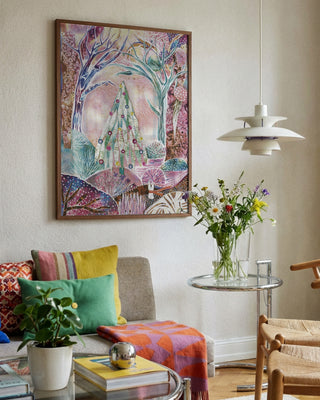 Believe in Magic by Enikő Marosváry-Kramcsák framed in a bright living room