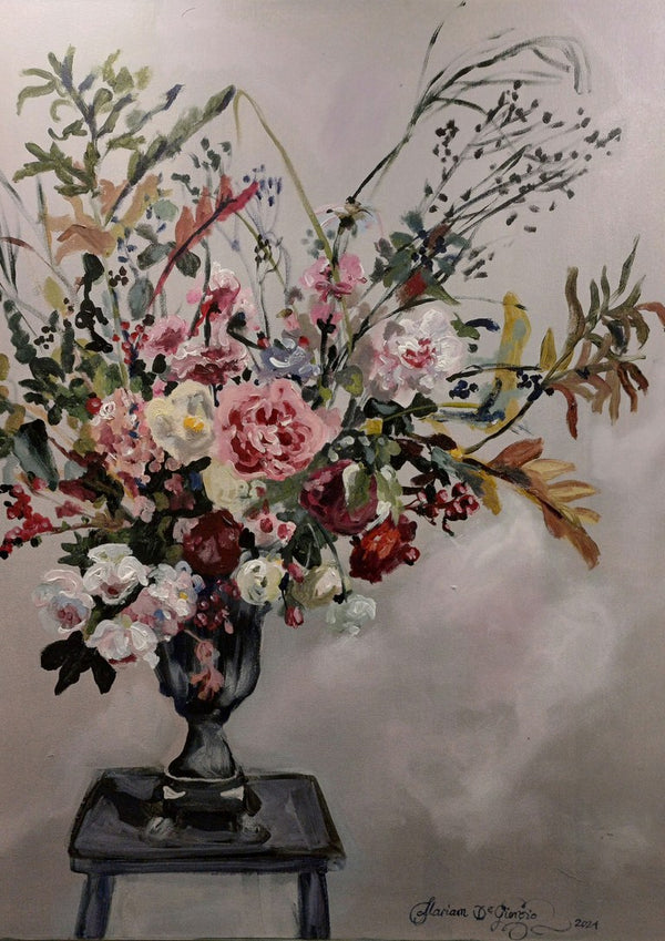 Floral arrangement on Grandmother's stool by Mariam De Giorgio - tall bouquet of pink roses and grasses in a grey urn on a stool