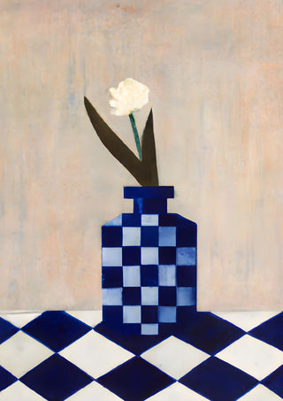 Check the vase by Interiorisla - a white carnation in a navy checked vase on a tiled floor