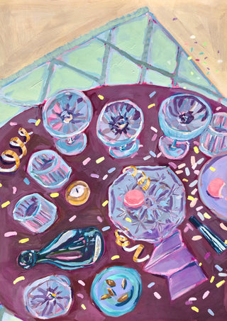 Dagen der på by DNF - empty glasses, confetti and macarons on a plum purple table