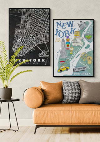Two framed New York travel maps hang above a tan sofa in a modern living room setting.