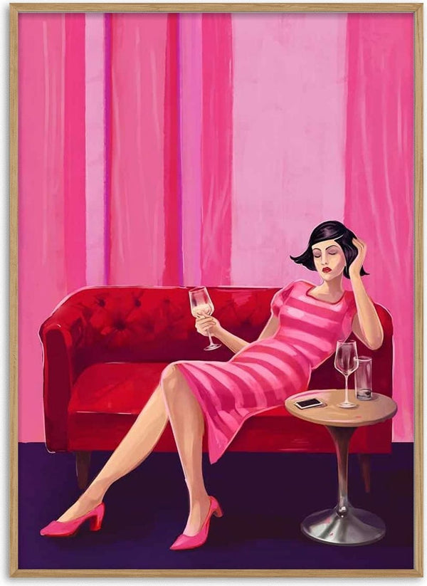 Illustration of a woman in a pink dress relaxing on a red sofa with wine, from Before Dinner by Kate Aitana.