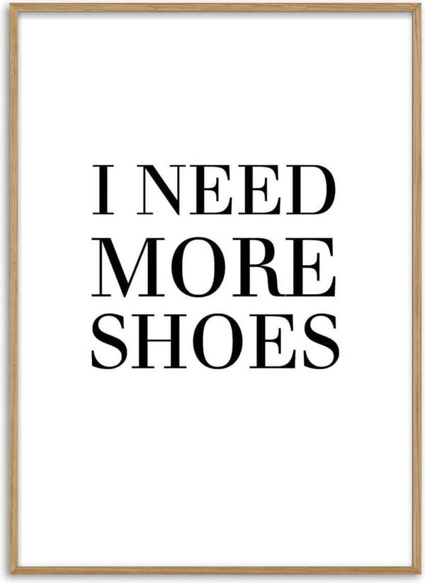 Minimalist poster with the black text "I NEED MORE SHOES" on a white background.