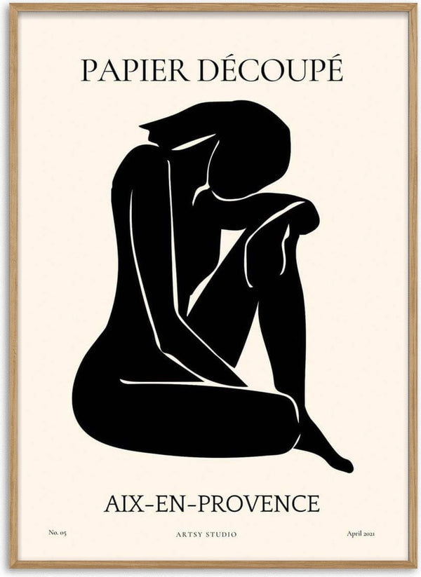 Minimalist black silhouette artwork of a seated figure, titled "Papier Découpé" for living room decor.
